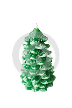 Green Christmas tree candle isolated on white background