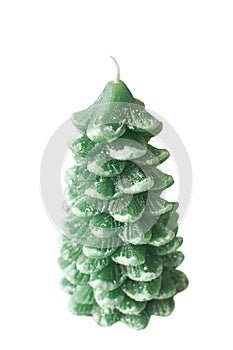 Green Christmas tree candle isolated on white background