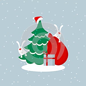 A green christmas tree with santa claus hat, red bag, gift box and two cute happy smiling white bunnies or hares peeking