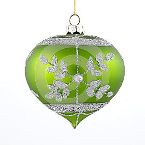 Green christmas tree toy on white background