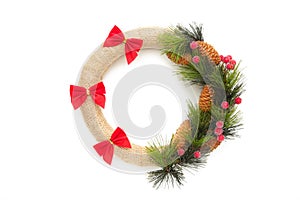 Green christmas wreath decorated with red bow isolated on white background. Thanksgiving Day