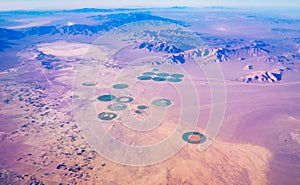 Green circle formed by center pivot irrigation farm