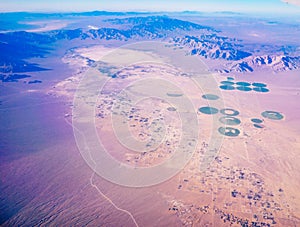 Green circle formed by center pivot irrigation farm