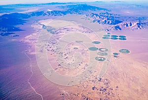 Green circle formed by center pivot irrigation farm