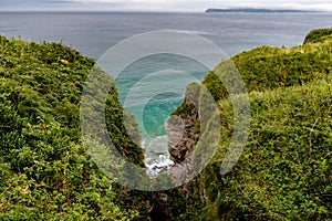 Green cliffs in northern ireland along the coast of antrim