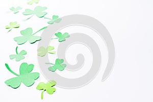 Green Clovers on white Background Background for St. Patrick`s Day Holiday