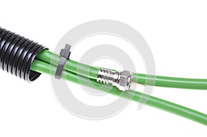 Green coaxial cable with F connector in corrugated pipe