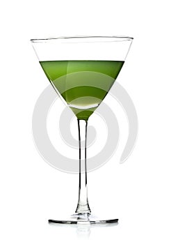 Green cocktail drink in martini glass