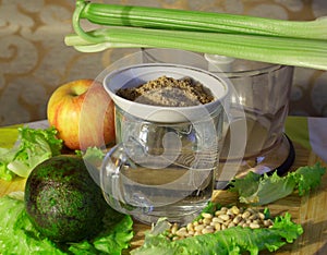 green cocktail lettuce and celery, avacado and apple, pine nuts and flaxseed flour