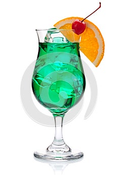 Green cocktail with orange and maraschino