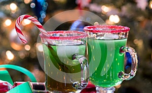 Green cocktail with red sugar rim