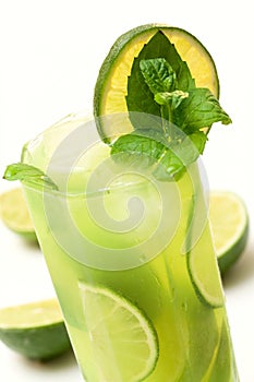 Green coctail with lime, mint and ice