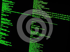 Green code in command line interface on black background. UNIX bash shell