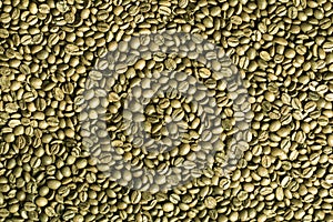 Green coffee beans background.
