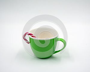 Green coffee pot with candy cane