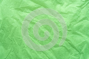 Green color creased paper tissue background texture