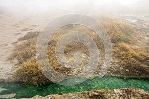 The green color of hot water at the source in the Rupite, Bulgaria