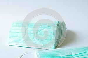 Green color Medical mask for protection against flu and other diseases. Surgical protective mask. Medical respiratory bandage face