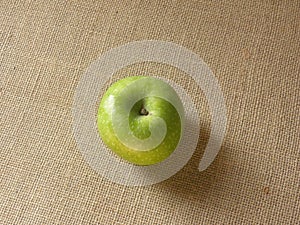 Green color ripe whole Granny Smith apple isolated