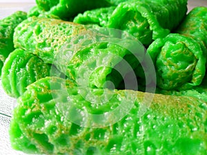 green color is synonymous with rolled pancakes photo