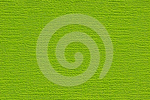 Green colored plain textured cardstock background image.