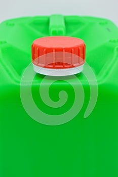 Green colored plastic detergent bottle. Cosmetic, container.