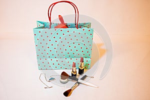 A green colour love sign valentines day gift shopping bag for woman with cosmatics gift for loved ones with lipstick