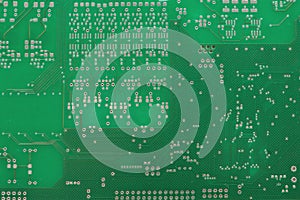 A green computer circuit board background.