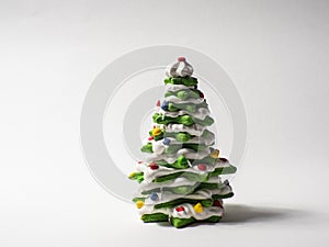 Green cookie christmas tree made by star cookie cutter on white background