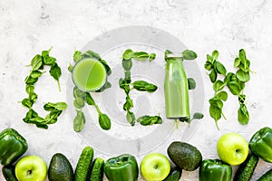 Green copy for greeny smoothy composition with vegetables on stone background top view mockup