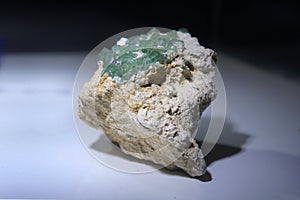 Green corundum rock form Tanzania isolated on white background.