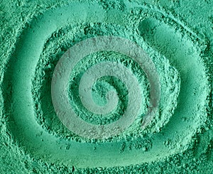 Green cosmetic clay powder kelp facial mask, spirulina body wrap texture close up, selective focus. Abstract background