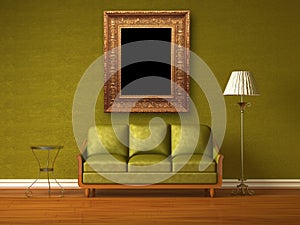 Green couch, table and standard lamp