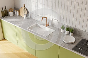 Green countertops in white kitchen, top view