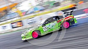 Green Coupe drifting at Formula Drift 2010