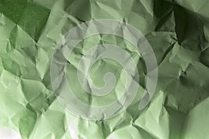 Green crepe Wrinkled Paper Texture background abstract