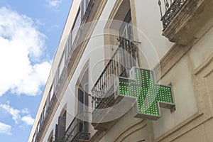 Green Cross Pharmacy Sign Illuminated with LED Lights