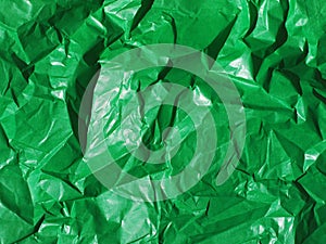 Green crumpled paper background