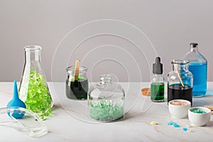 Green crystal grown by a child. Science is fun concept. Experiment with children at home