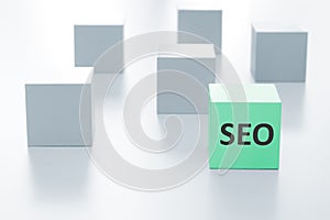 Green cube with SEO sign.