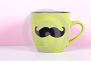 Green cup with paper mustache o