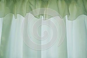 Green curtain or drapery background