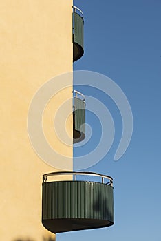 Green curved functionalism style balconys Stockholm photo