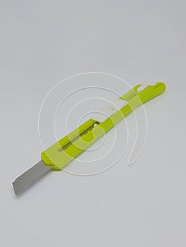 Green cutter isolated in the white background