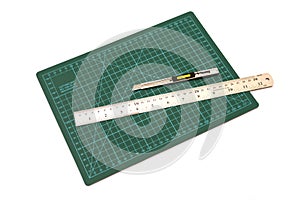 Green cutting mats with iron ruler and cuter