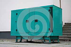 Green diesel powered generator connected to building