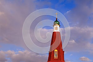 The green dome of the old Russian Christian church against the b