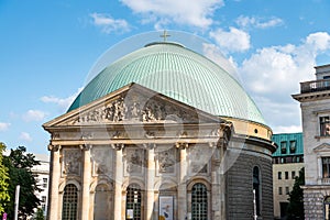 Green dome of St. Hedwig`s Cathedral, a Roman Catholic cathedral on the Bebelplatz in Berlin, Germany. It is the seat of the