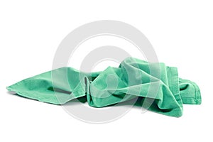 Green domestic textile cleaning cloth.Crumpled napkin.Household fabric
