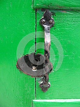 Green door with doorknob